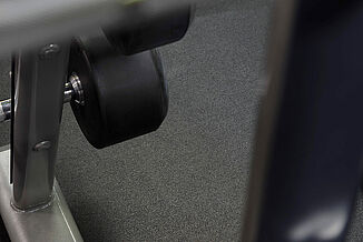 Anytime Fitness - Texture of REGUPOL sonusfit m5520 Close view of the REGUPOL sonusfit m520 flooring utilized in Anytime Fitness in Fairmount Philadelphia.