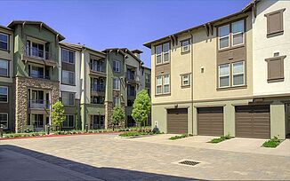 Daylight view of the exterior and garages of the Avalon Bay Community residencies in Glendora.