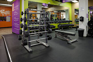Anytime Fitness - Dumbbell Racks and Benches Dumbbell racks and benches at the Anytime Fitness facility, featuring REGUPOL sonusfit m520 flooring.